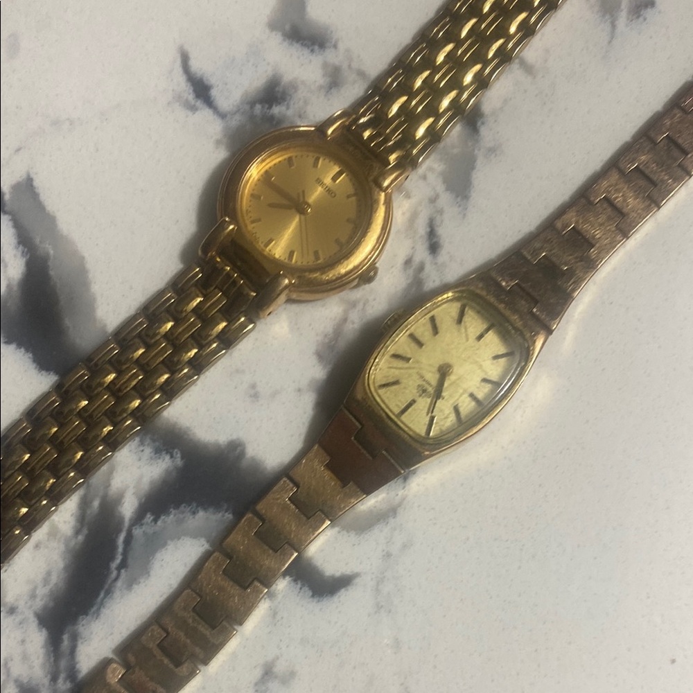Gold and Silver Vintage Watches with Classic Analog Display
